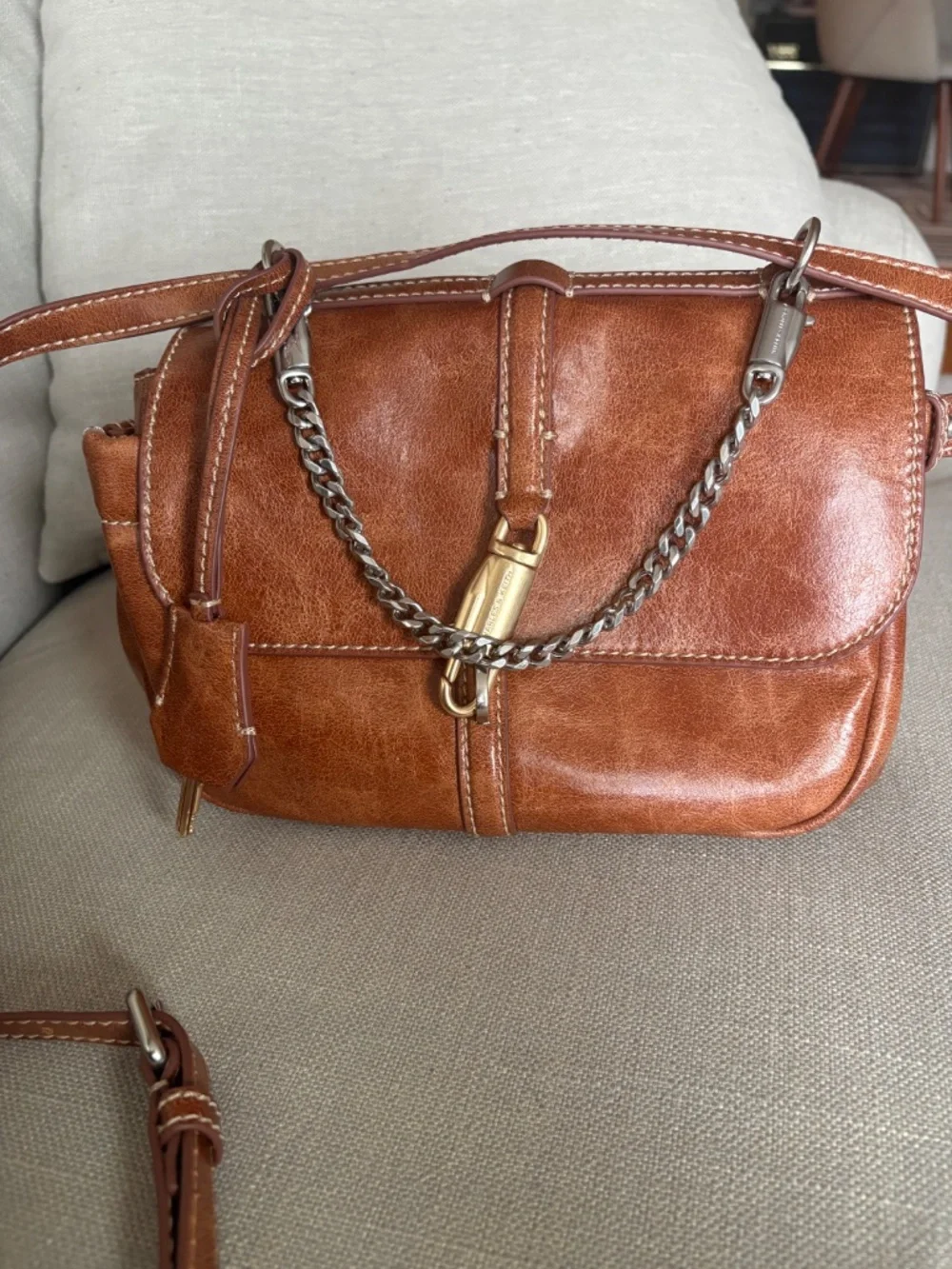 CHARLES & KEITH Delfina Chain Crossbody Bag in Distressed Tan